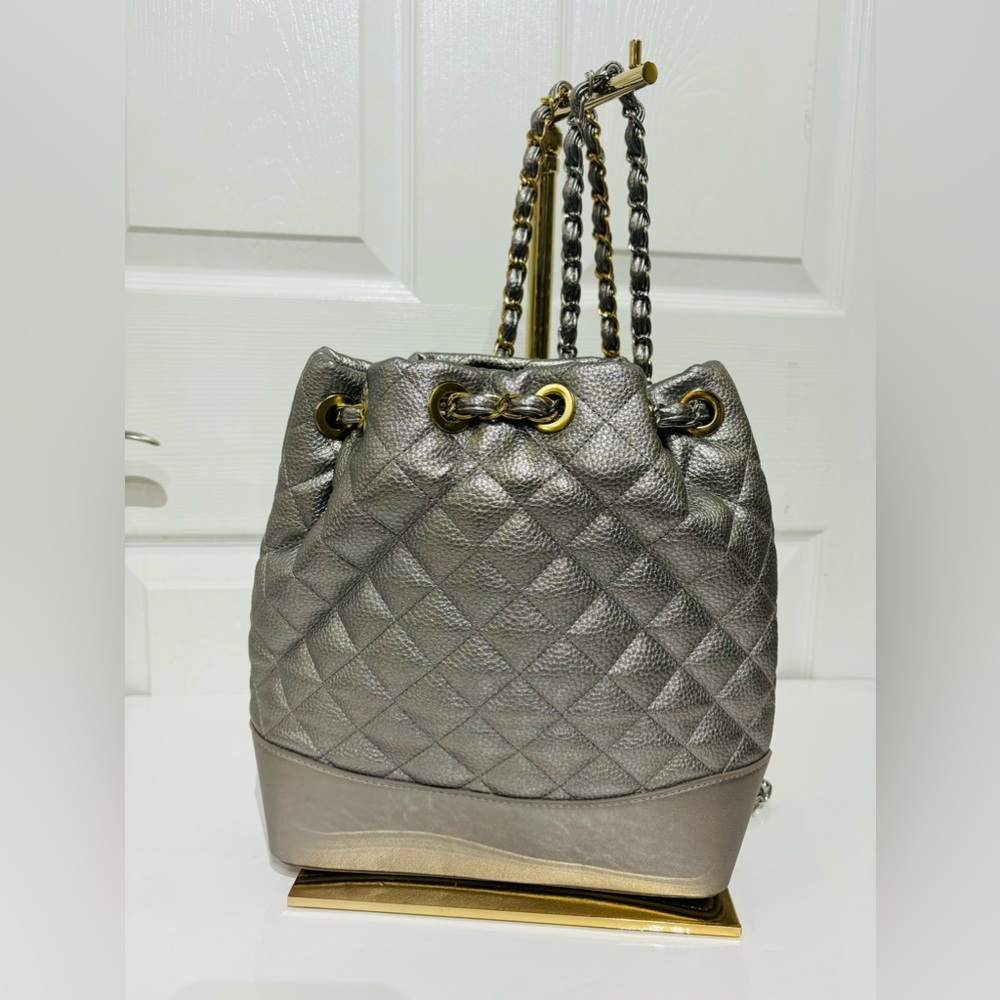 Quilted Metallic Silver Drawstring Backpack